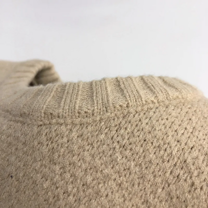 Textura tejida del suéter infantil