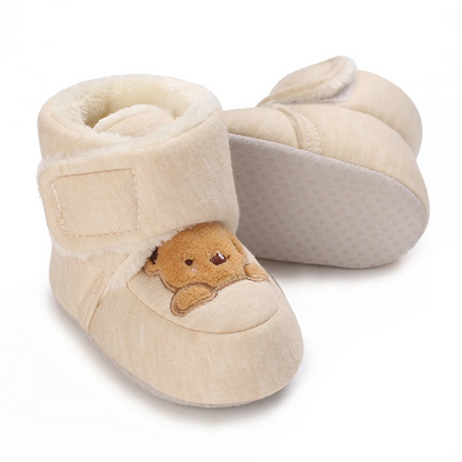 Zapatos cálidos para bebé con acabado suave y confortable