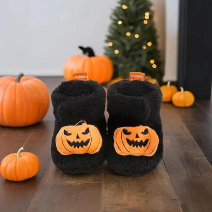 Vista lateral de pantuflas de Halloween con corte hasta el tobillo
