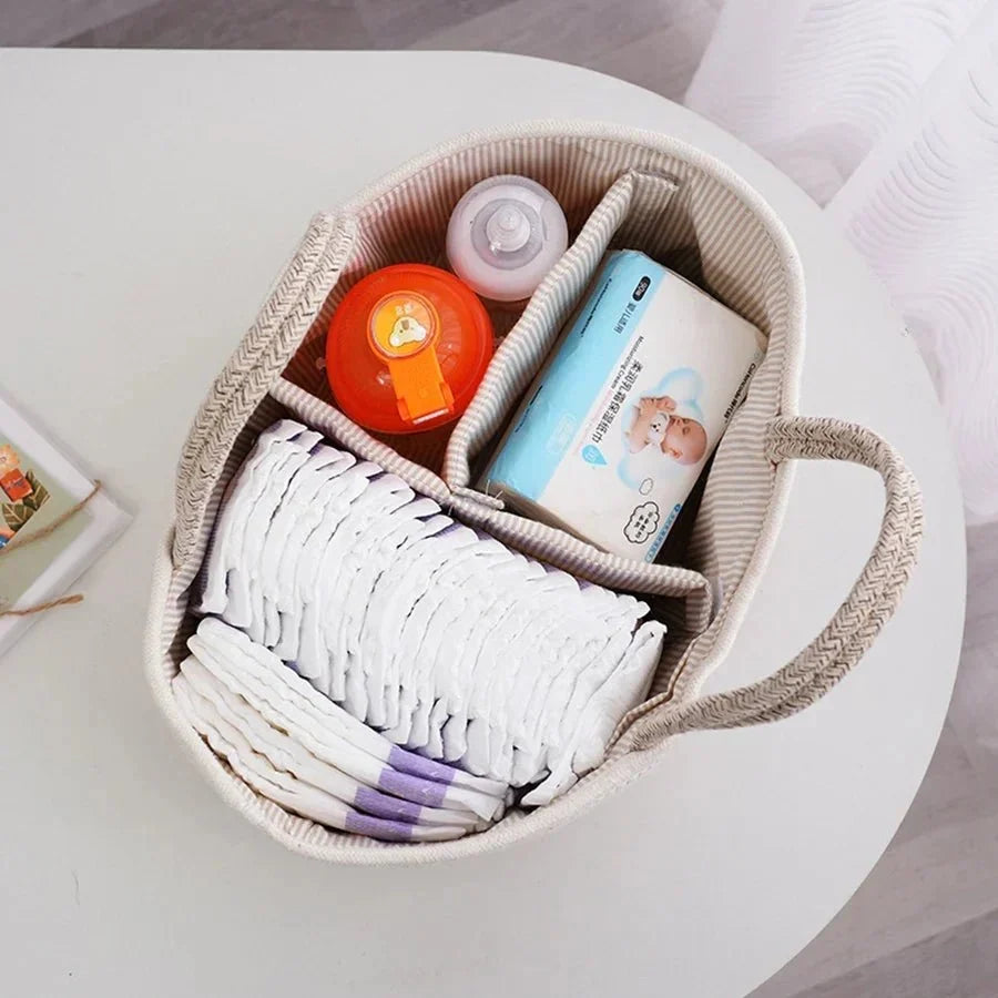 Organizador de pañales con compartimentos para artículos esenciales