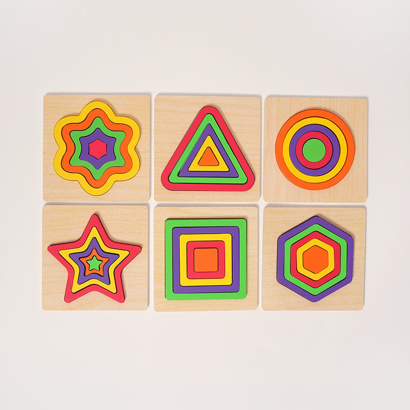 Tablero de madera Montessori con espacios para encajar formas