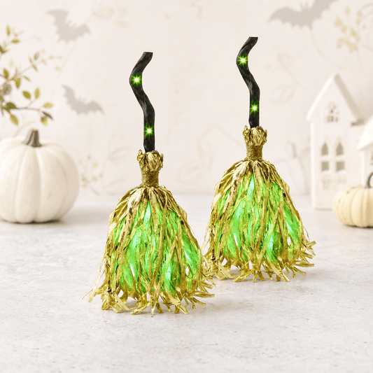 Escoba de Halloween animada con luz verde y sonido para decorar fiestas.